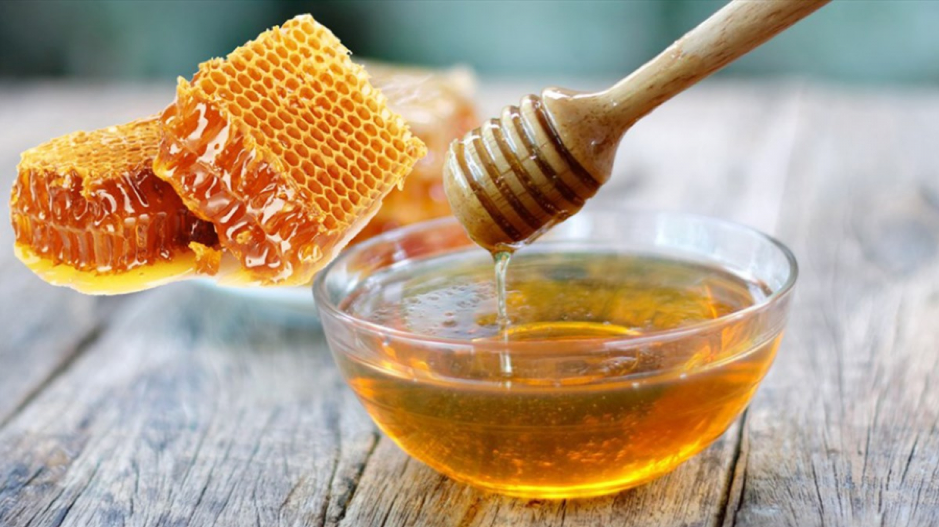 chữa  nhiệt miệng tại nhà bằng mật ong